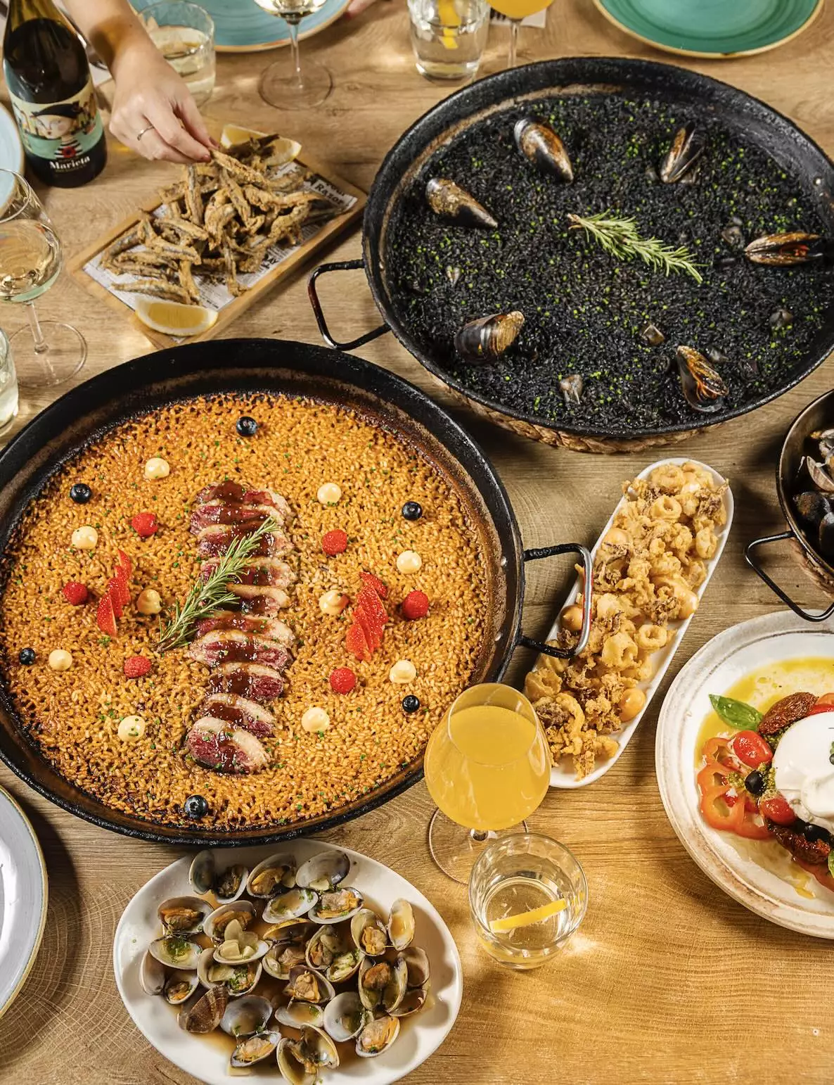 Mana 75 paellas y entrantes